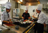 image of chef smelling a dish